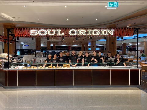 The Eastgardens team standing at their store