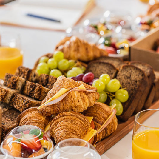  Soul Origin Catering options, including drinks, croissants, banana bread, and fruit platters