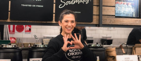 Woman making heart sign with hands